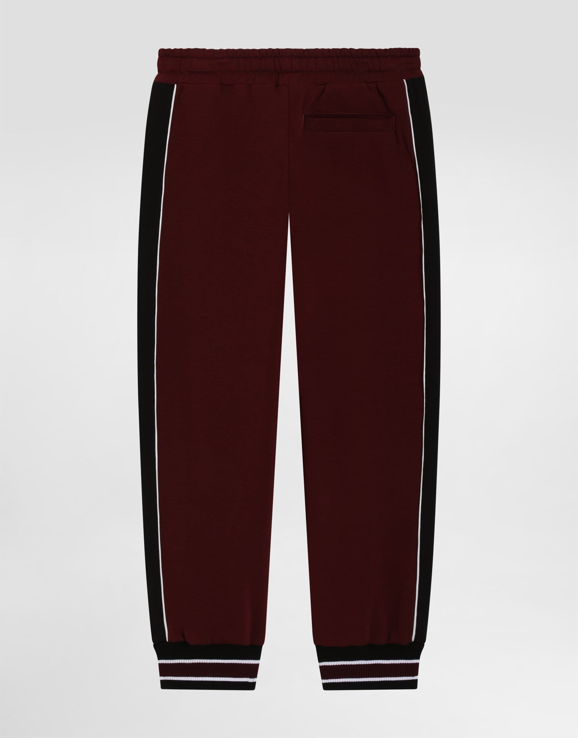 Bawełniane spodnie dresowe Dolce & Gabbana Kids z dzianinowymi ściągaczami przy mankietach - 2